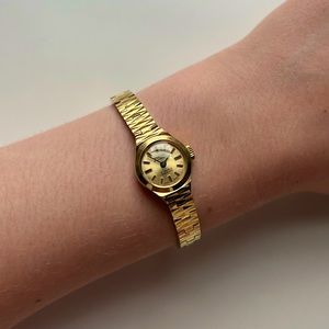 Vintage Montine of Switzerland tiny mechanical watch, c. 1970s, gold plated